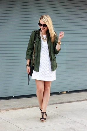 white lace or textured dress / utility jacket / statement necklace 